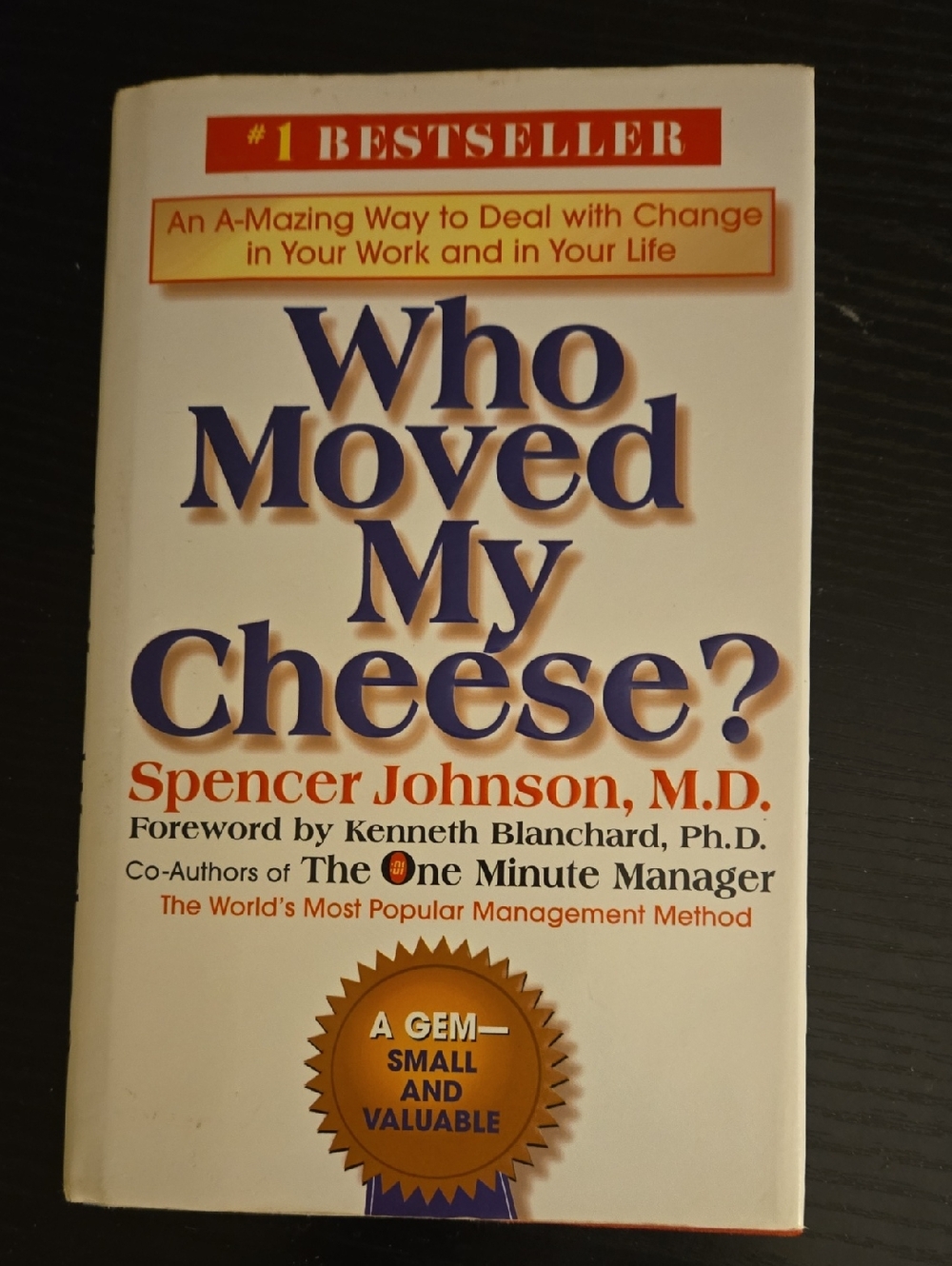 Who Moved My Cheese? by Spencer Johnson - White Cover with Blue & Orange Text